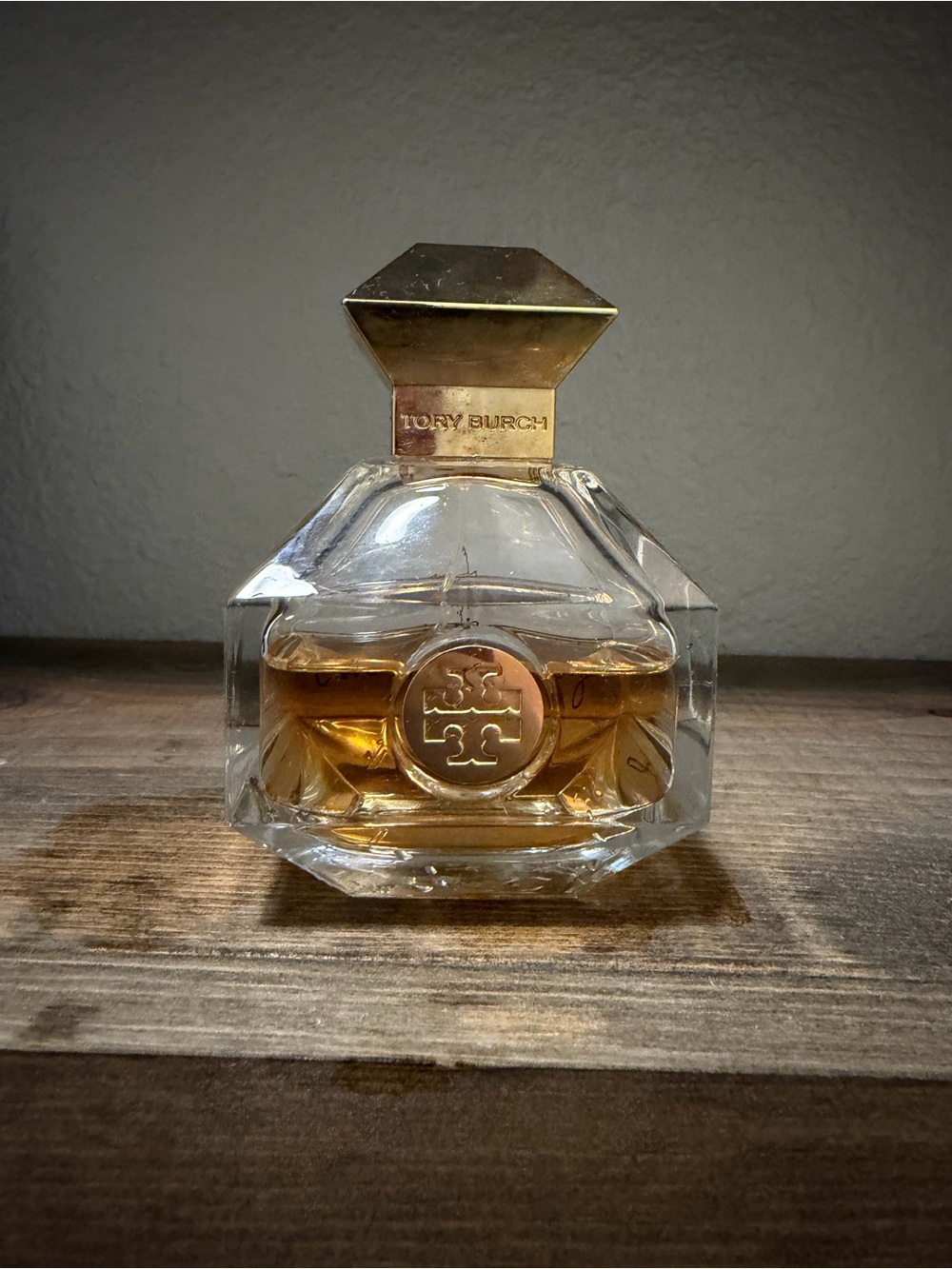 **Discontinued scent Tory Burch Glass Bottle with Gold Accents**